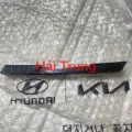 Phe cài cản dưới Kia Carens 2009