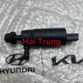 Mô tơ bơm nước rửa đèn pha Hyundai Tucson 2015-2021 chính hãng 985103F200.