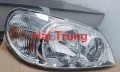 0K53A51030 Đèn pha Kia Carnival 2005-2009