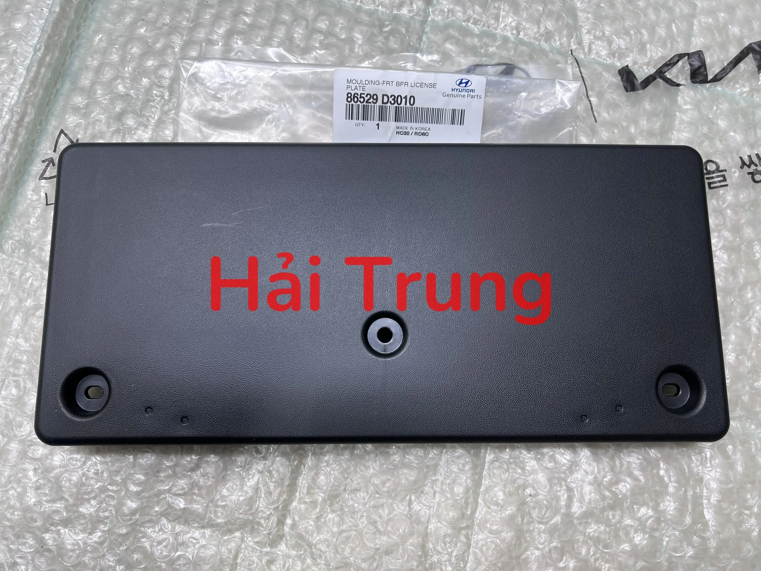 Ốp cheo biển số Hyundai Tucson 2015-2019 chính hãng 86529D3010.