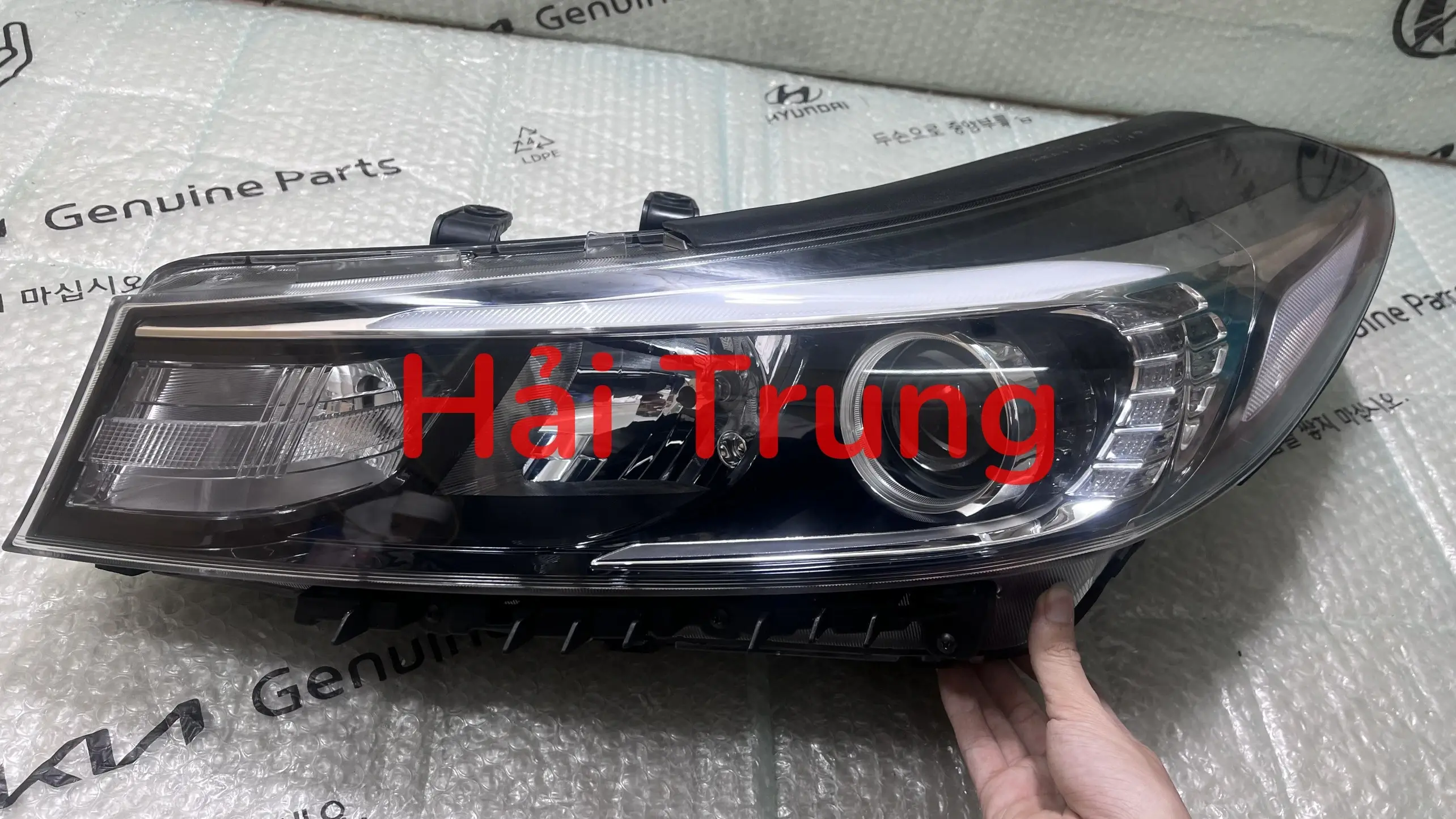 Đèn pha Kia Cerato tháo xe