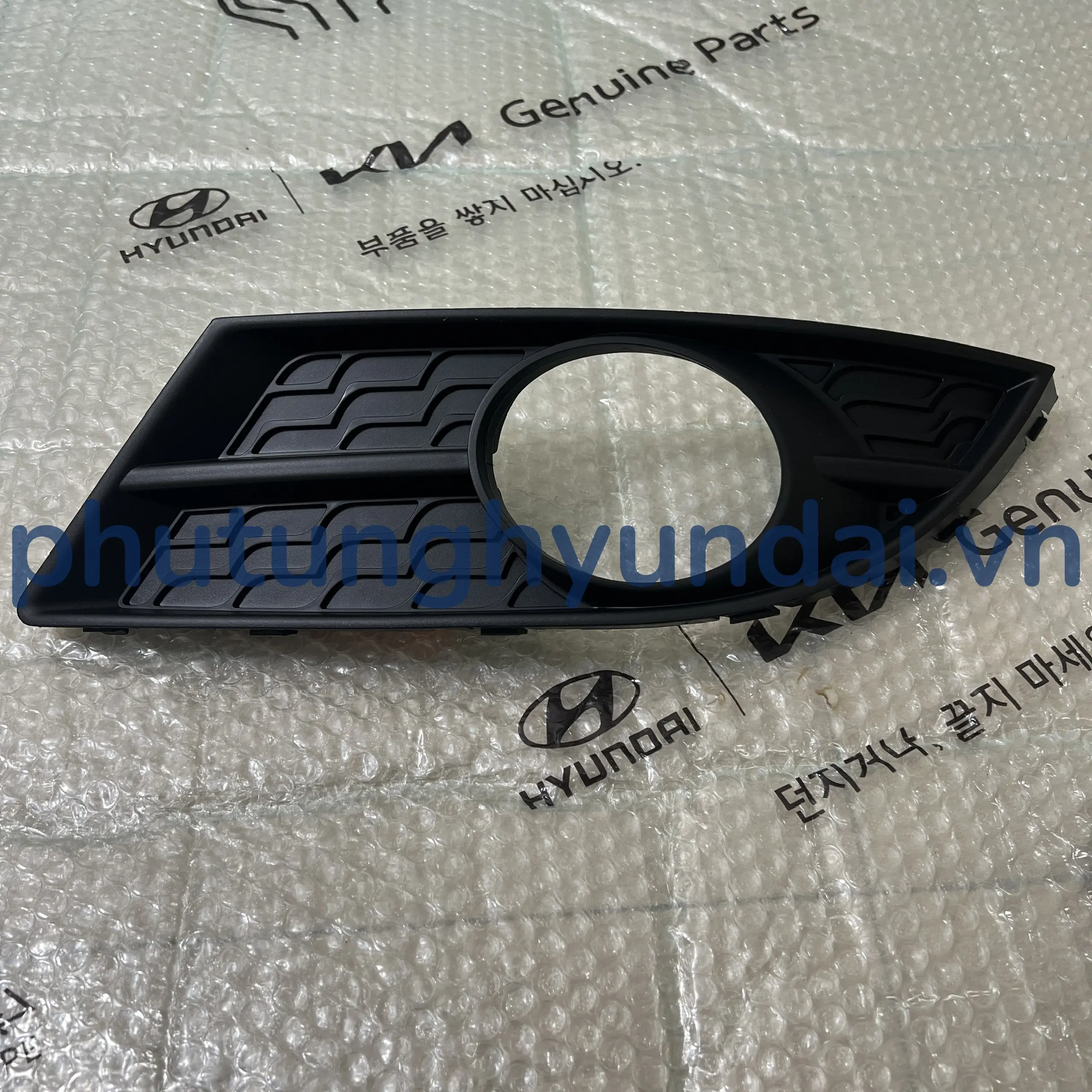 Ốp đèn gầm bên tài Hyundai Avante 2011