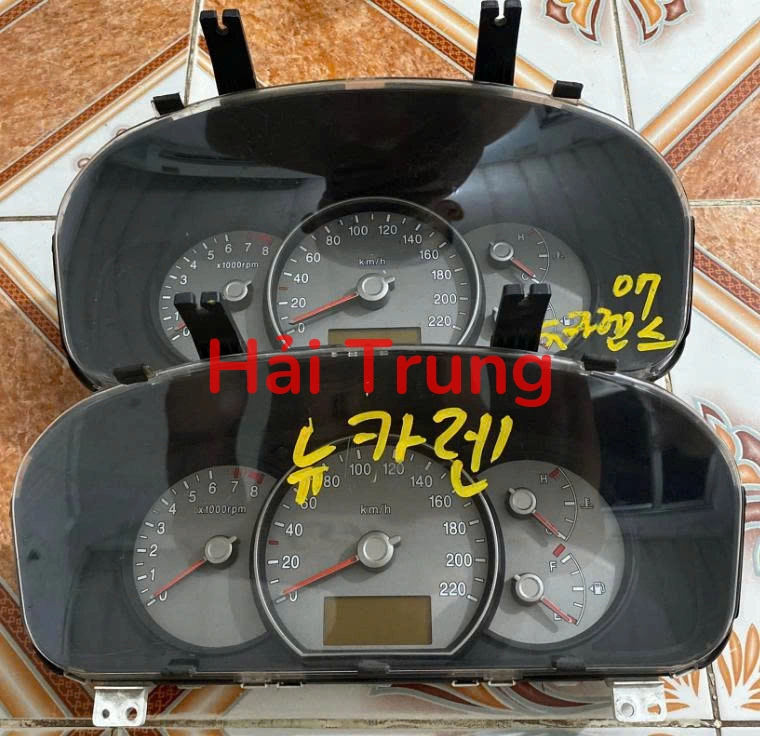 Tháo xe Đồng hồ táp lô Kia Carens 940031D270