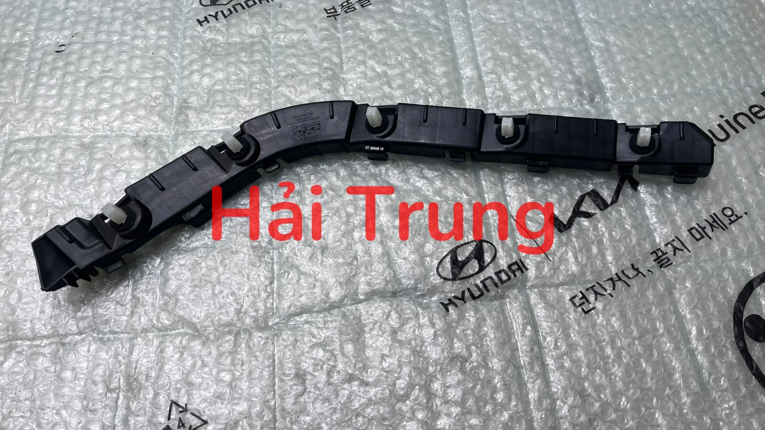 Phe cài cản sau Hyundai Santafe 2013-2018 chính hãng 866142W000.