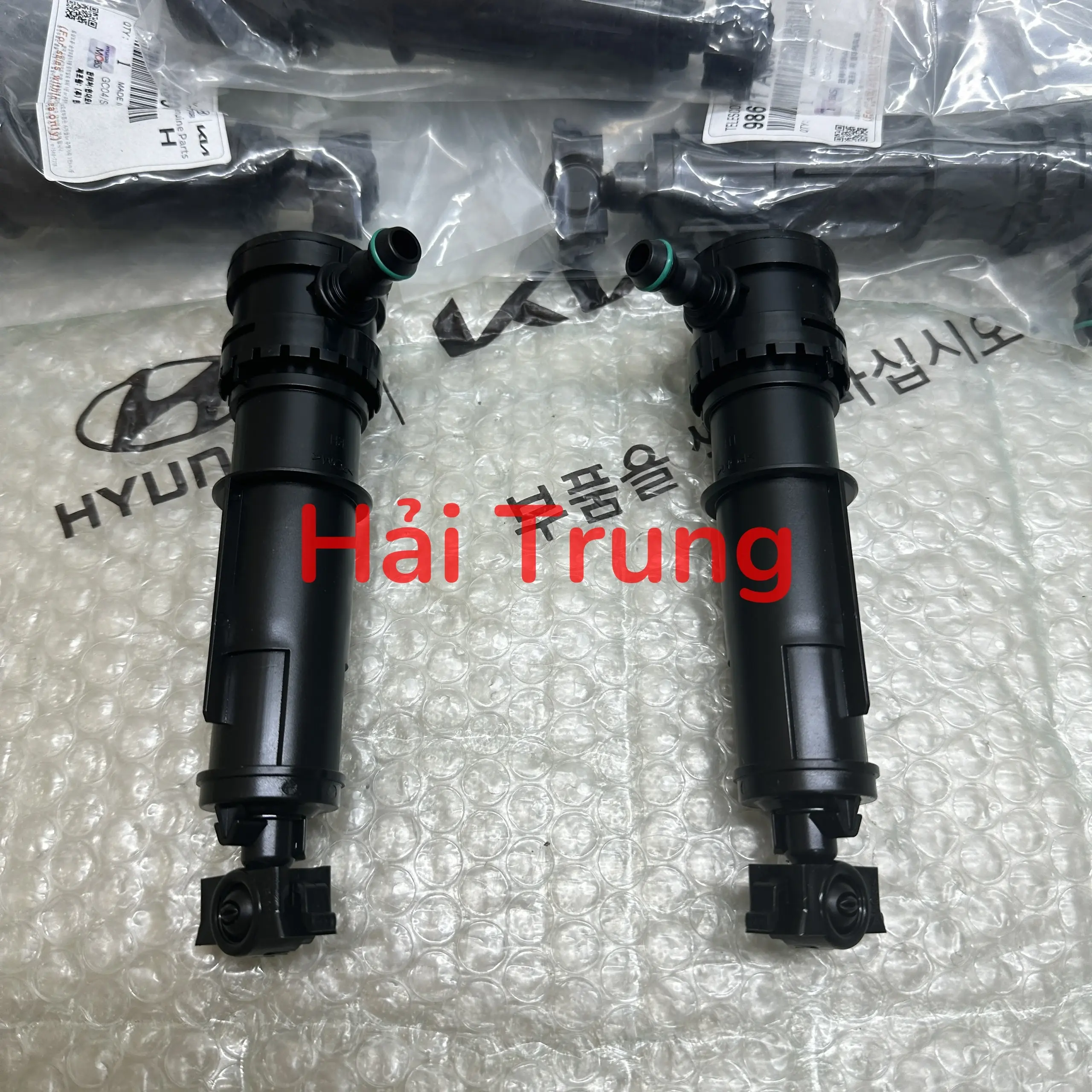 Vòi phun nước rửa đèn pha Kia Sedona 2014-2018 cao cấp 98671A9000 98672A9000