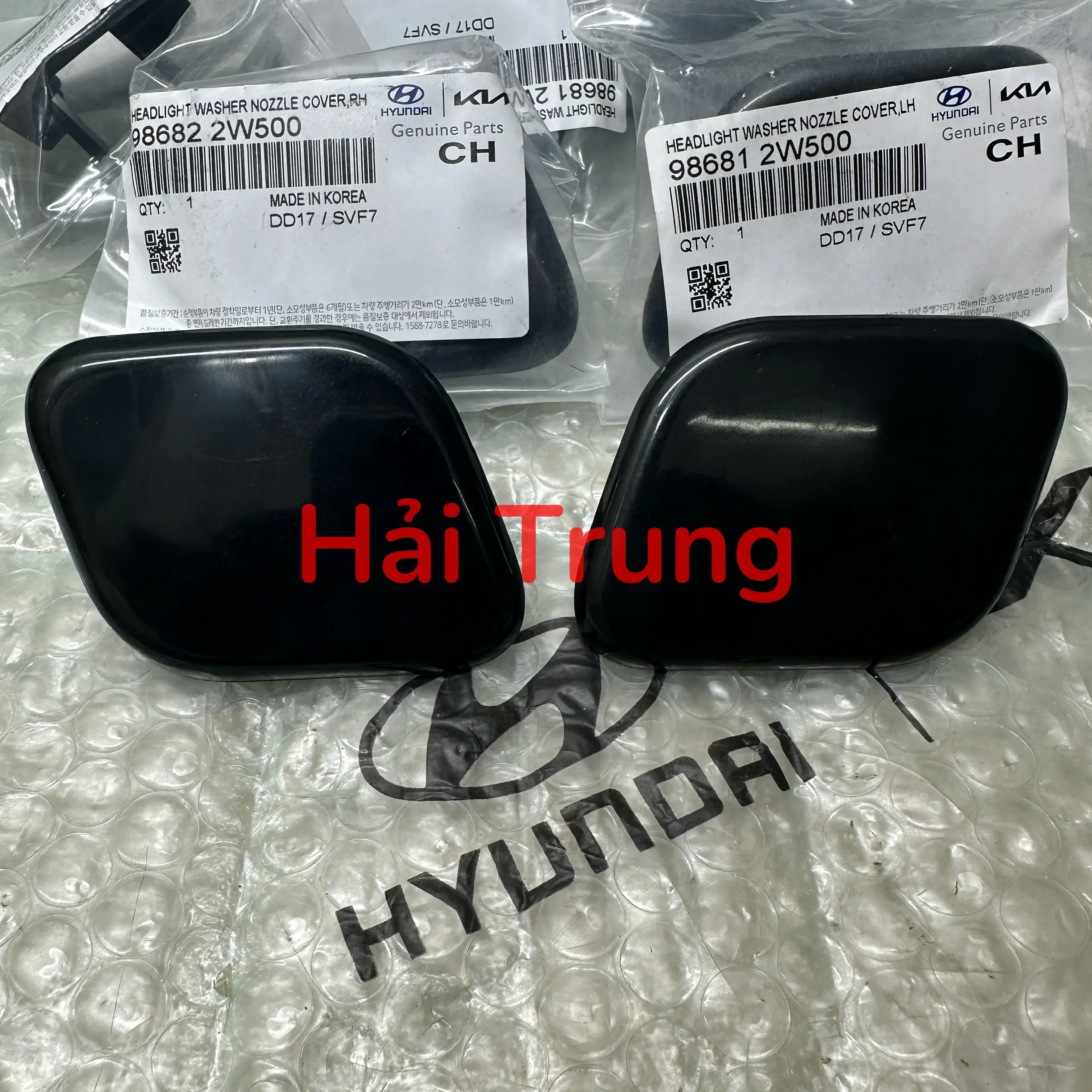 Nắp đậy vòi phun nước rửa đèn pha Hyundai Santafe 2015-2018 cao cấp 986812W500 986822W500