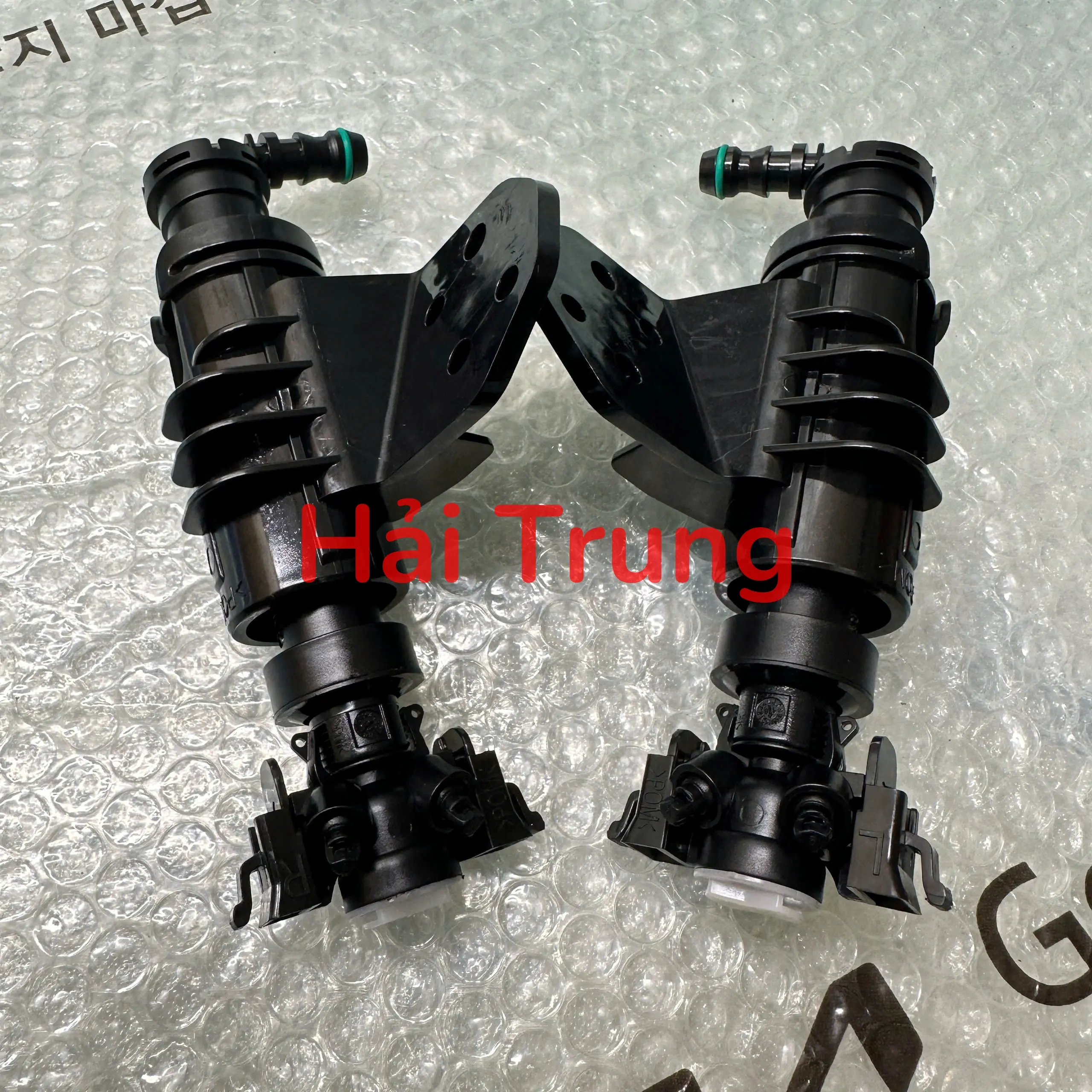Vòi phun nước rửa đèn pha Hyundai Tucson 2015-2018 cao cấp