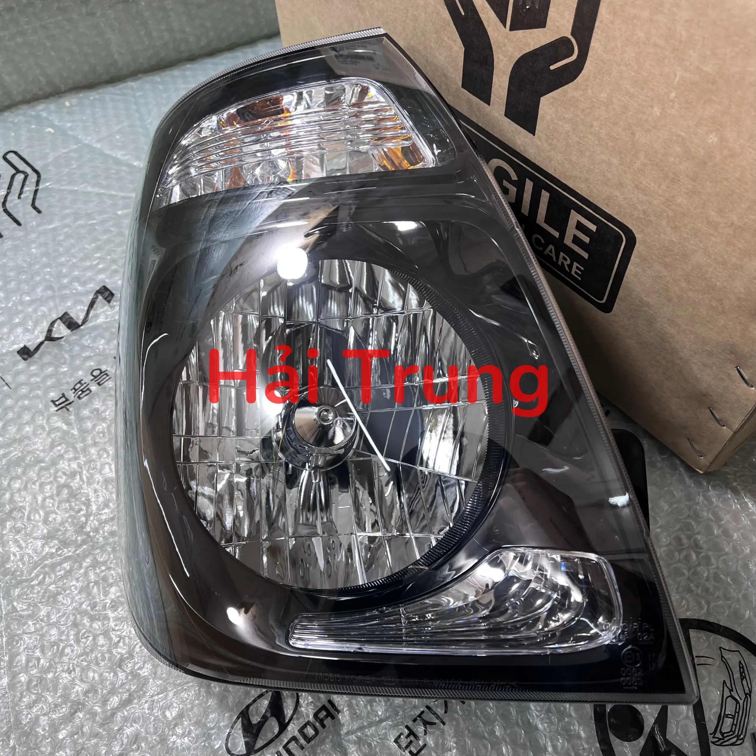 Đèn pha Kia Frontier K250 chính hãng